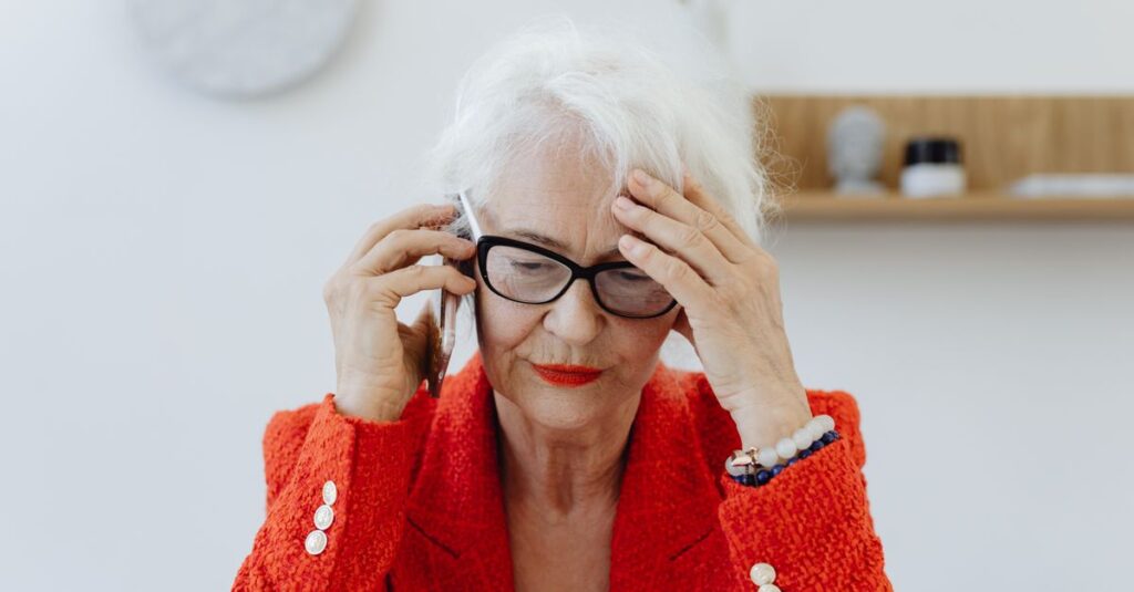elderly person phone worried home