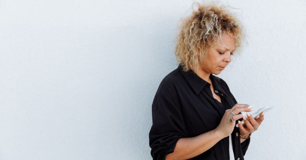 elderly woman phone worried home
